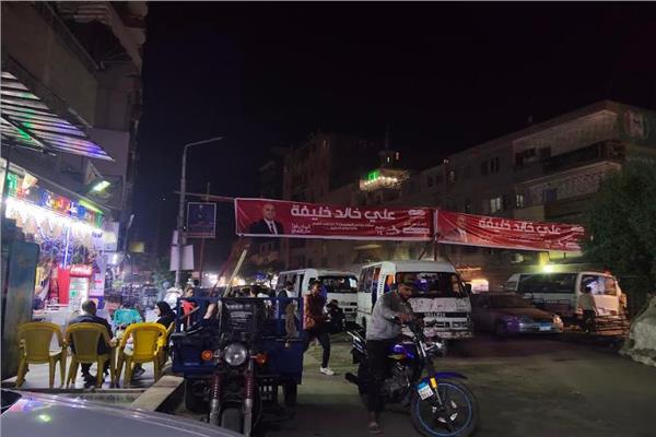لافتات «نواب البرلمان» فوق مقالب القمامة تثير غضب المواطنين في الجيزة